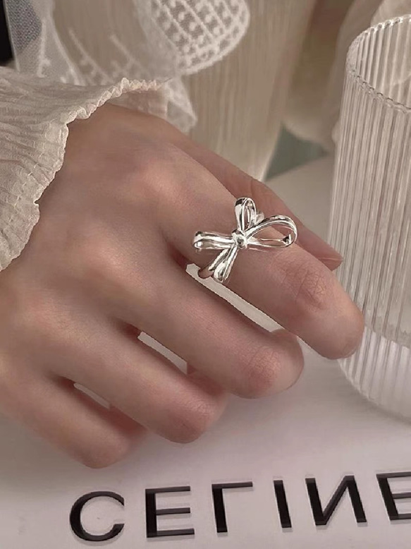 ファッションシンプルシルバー　可愛いリボン指輪 1枚目の画像