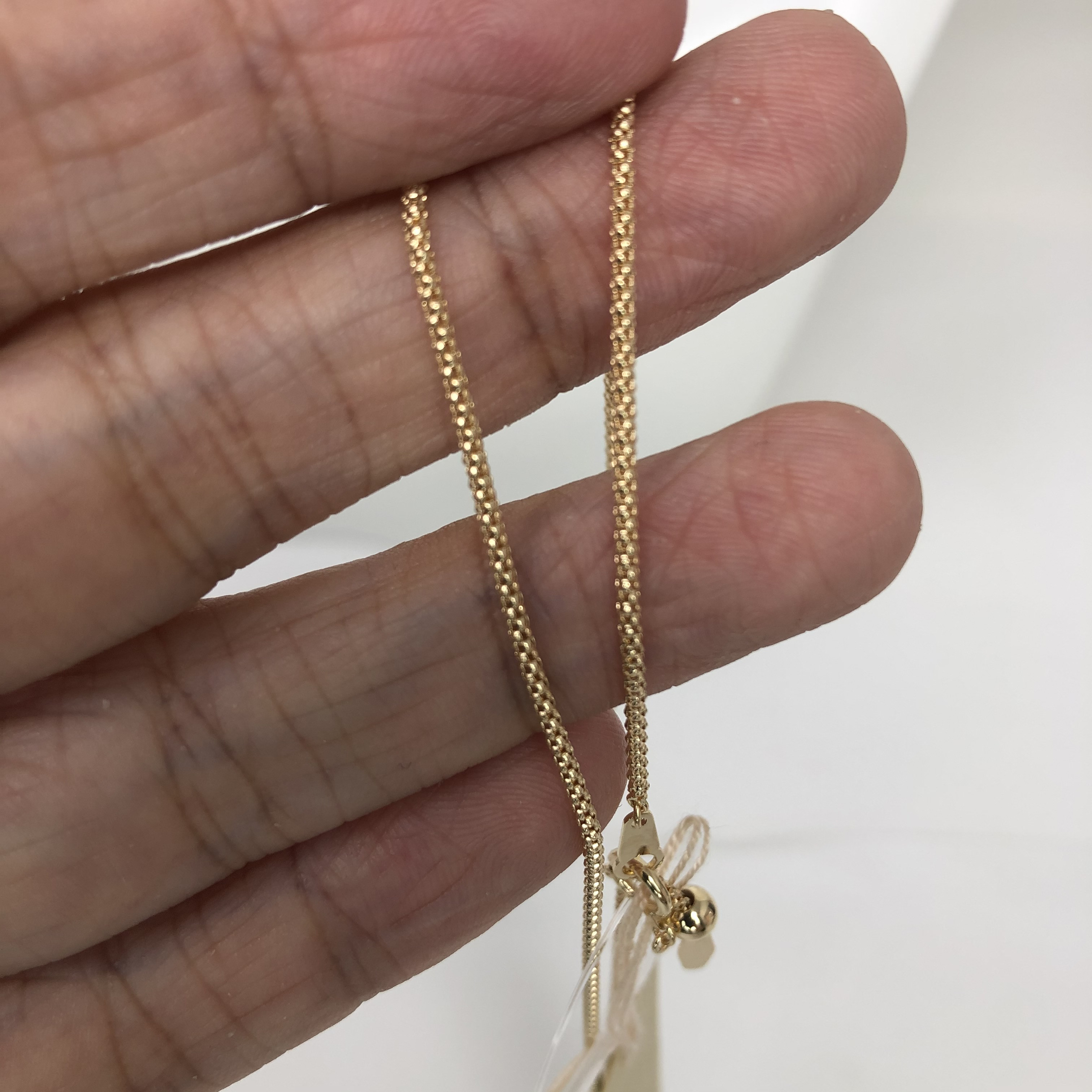 k18YG AU750 18金　イエローゴールド  マルベリー デザイン の幅1.4ミリ