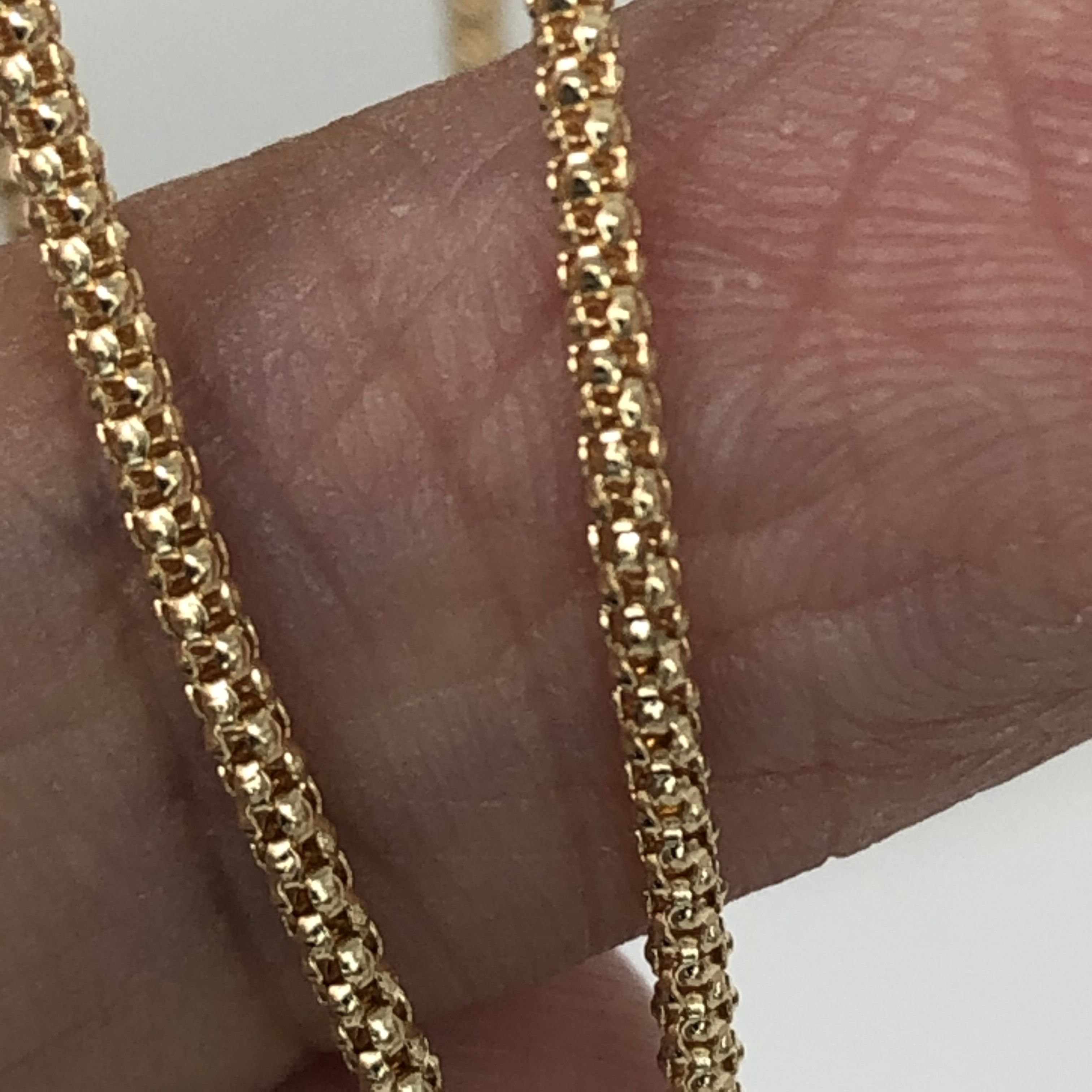 k18YG AU750 18金　イエローゴールド  マルベリー デザイン の幅1.4ミリ