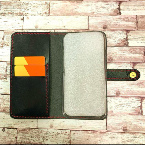 栃木レザー　ブラック　iPhoneケース　　手帳型　本革　スタッズ　星　ポケット付き　ベルト付き 2枚目の画像
