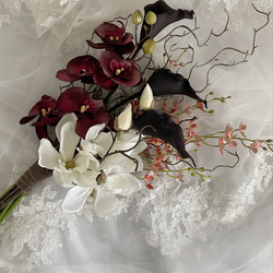 胡蝶蘭、カラー、マグノリア、枝、ウェディングブーケ、クラッチブーケ、和装ブーケ 1枚目の画像
