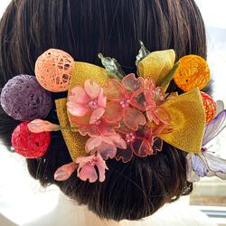 桜と蝶と糸玉の髪飾り 1枚目の画像