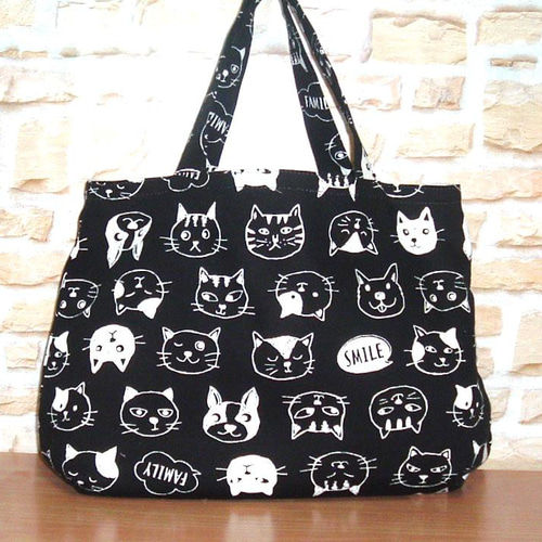 猫顔柄可愛いトートバッグ サブバッグ スマイル猫 黒 トートバッグ