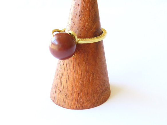 A celadon jade slit ring, jue, Western Zhou dynasty and a