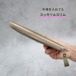 【8種顏色】這款小巧纖薄的長款皮夾無需折疊即可裝下鈔票！它小巧實用，採用超輕、防水防刮的高品質合成皮革製成（按需定制）。 第12張的照片