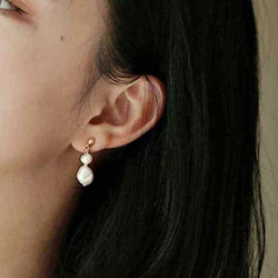 淡水珍珠耳環流行無痛無孔金白珍珠水晶矽膠套耳環 第13張的照片
