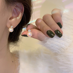 淡水珍珠耳環流行無痛無孔金色白色優雅簡約矽膠套正品珍珠耳環 第16張的照片