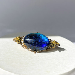 エメラルドグリーンの宝石風ヘアゴム / 青 / 半球 / レジン / 海