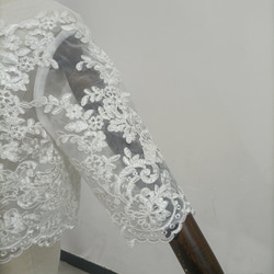 優雅波萊羅式精緻蕾絲 3/4 袖包扣婚紗 第4張的照片