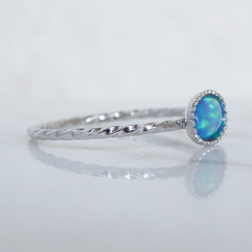 海の欠片＊水色オパール華奢ツイストリング（横向きオーバル