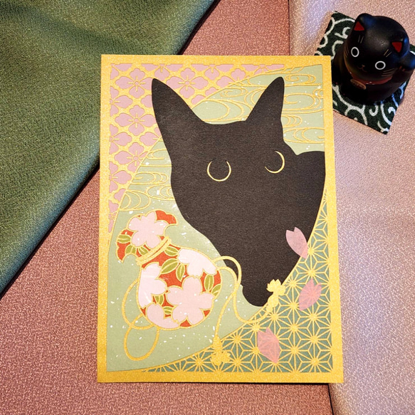 黒猫と和柄 切り絵アート 2L判 (桜巾着) 1枚目の画像
