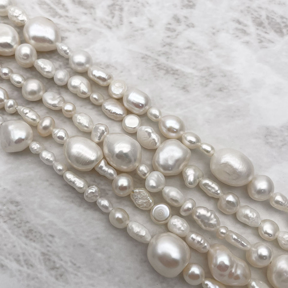 バロックパール 淡水真珠 ライス ポテト ボタン 雫 ケシ ミックス 3mm~12mm 半連20cm 極小粒 大粒 1枚目の画像