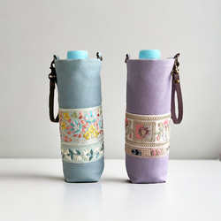 ペットボトルカバー　青い薔薇　本革持ち手付き　ハンドメイド b565f26e4a7fc312fa4513c3ed496c