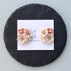 桜 ピアスorイヤリング 選べる 樹脂粘土イヤーアクセサリー 1枚目の画像