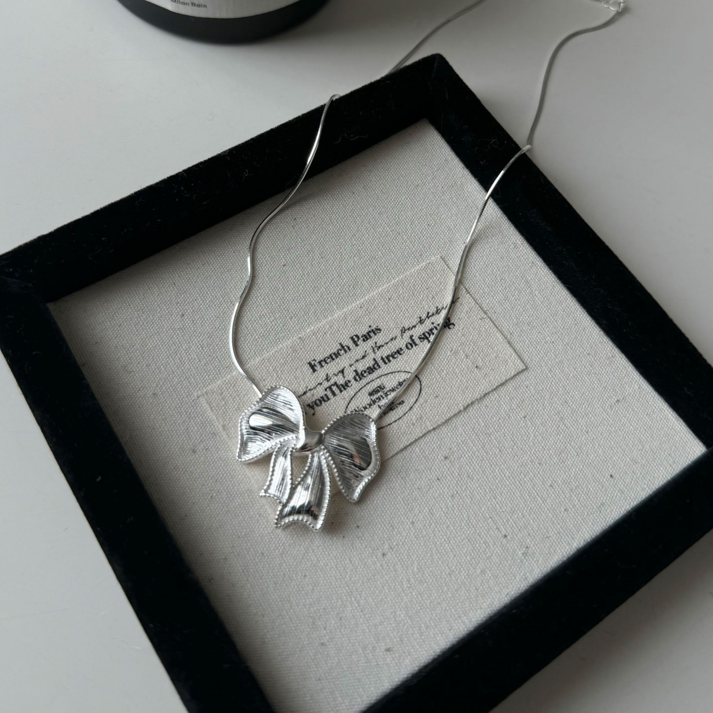 シルバー925ビッグ・リボン・ネックレス 甘く繊細な鎖骨チェーン