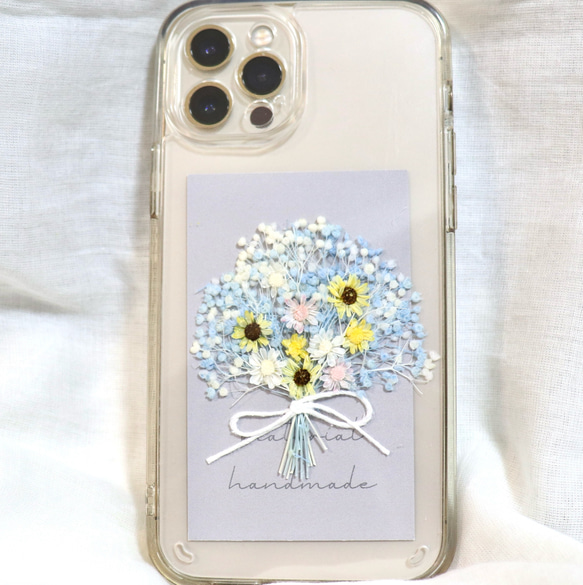 【全機種対応】スマートフォンインナーシート iPhoneケース カバー 挟む シート 紙 花 花束 ブーケ ひまわり 1枚目の画像
