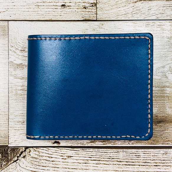 小銭入れが付いたシンプルな本革二つ折り財布　ブルー 1枚目の画像