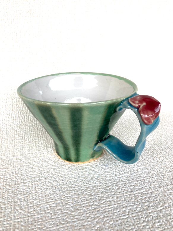 緑と水色のツートンカラーのオリジナルデザインのカフェカップ 1枚目の画像