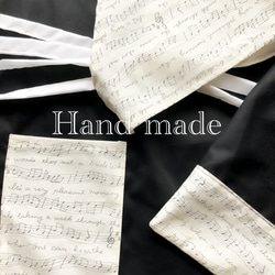 ハンドメイド　音符楽譜柄　エプロン　子供用　キッズ　黒＆白150センチ 2枚目の画像