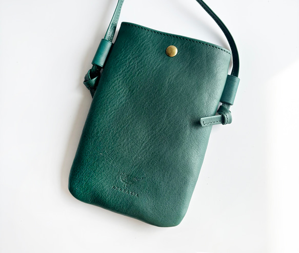 綠松石綠色智慧型手機小袋（亞利桑那州義大利皮革），附可自由調節肩帶 第3張的照片
