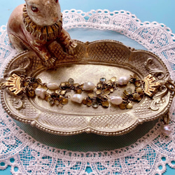 ✤バロック真珠と真鍮シェルのブレスレット/スカイブルートパーズ✤ 1枚目の画像