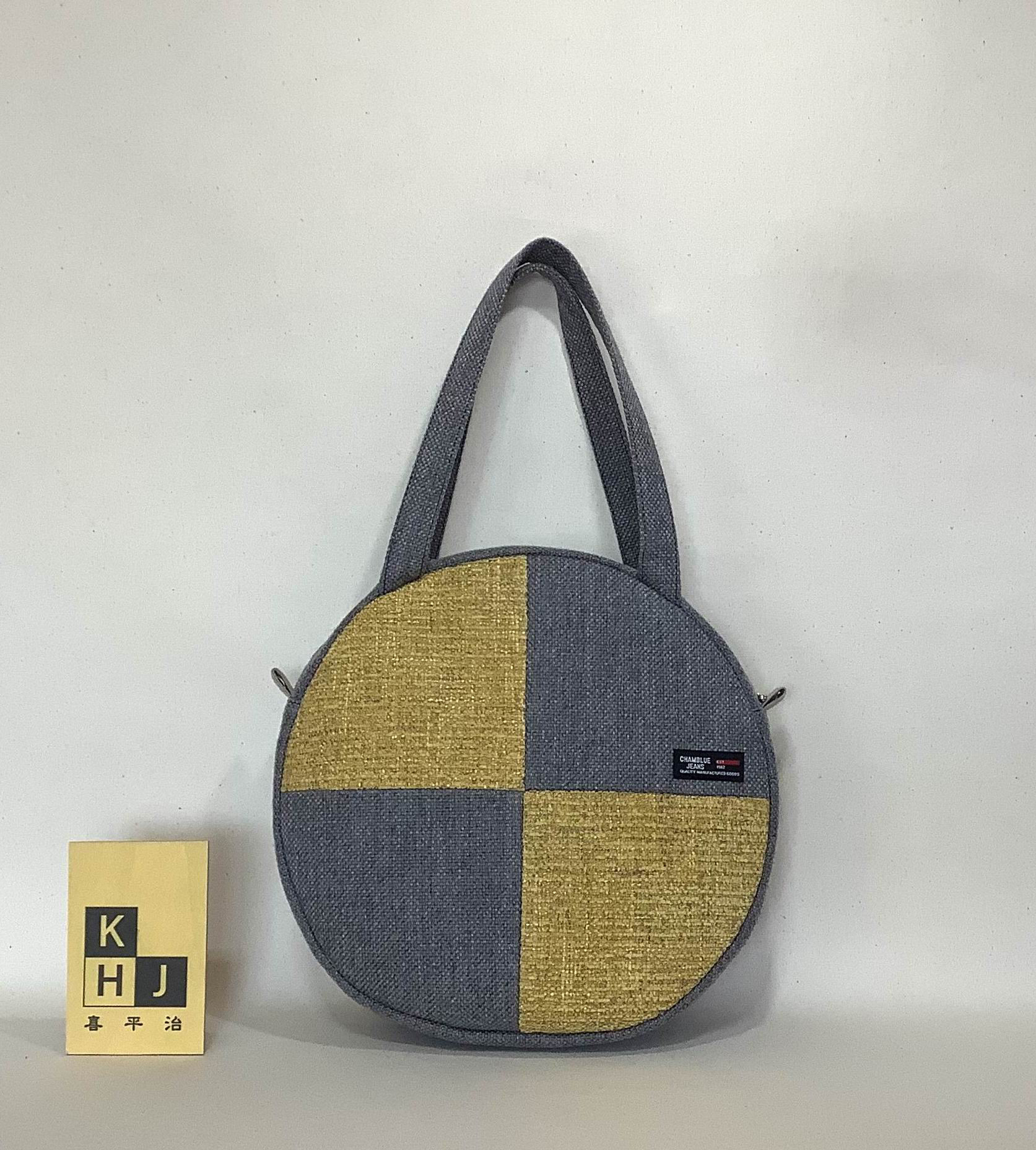 まん丸バッグ　ファスナー開閉　グレーとミモザ色の椅子生地