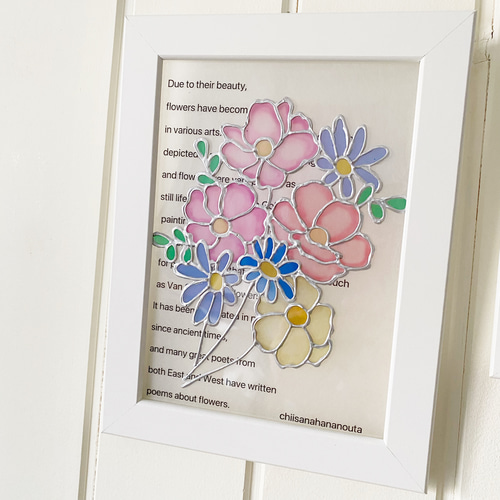 ラナンキュラスラックスとブルーデージーのアレンジ クリアグラス  