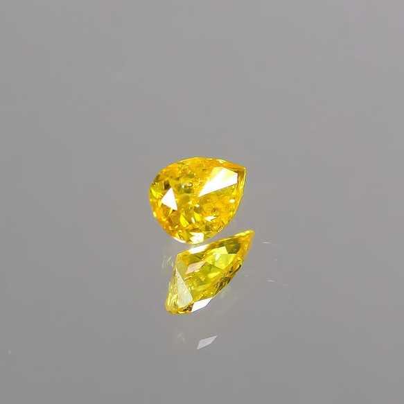 天然ファンシーヴィヴィッドオレンジイエローダイアモンド0.138ct 4枚目の画像