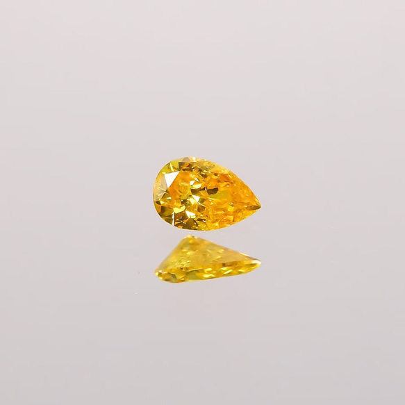 天然ファンシーヴィヴィッドオレンジイエローダイアモンド0.138ct 3枚目の画像