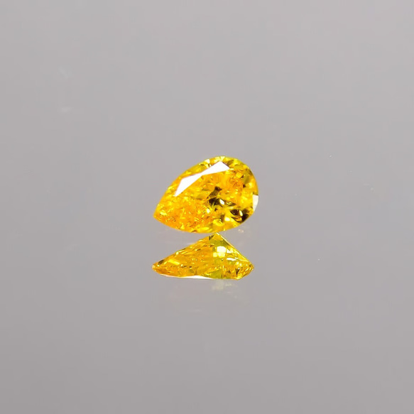天然ファンシーヴィヴィッドオレンジイエローダイアモンド0.138ct 7枚目の画像