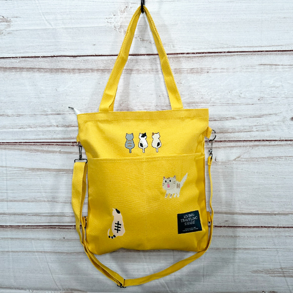 【免運費】帆布 2WAY 單肩手提包，內袋繡有驚喜貓和背貓 &lt;黃色&gt; 第1張的照片