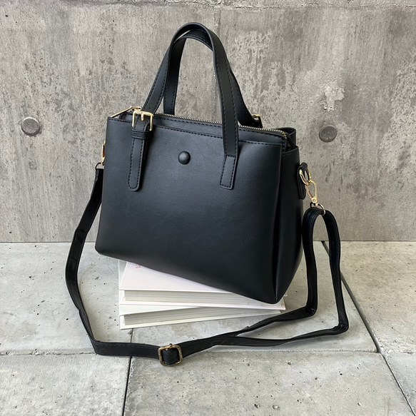 【極美品】印傳屋　ハンドバッグ　手提げバッグ　レザー　くるみボタン　ネイビー 極美品】印傳屋 ハンドバッグ 手提げバッグ レザー くるみボタン