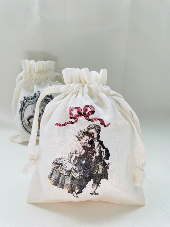 巾着袋Ｌサイズ　コットン　ロココ調ボーイ＆ガール 3枚目の画像