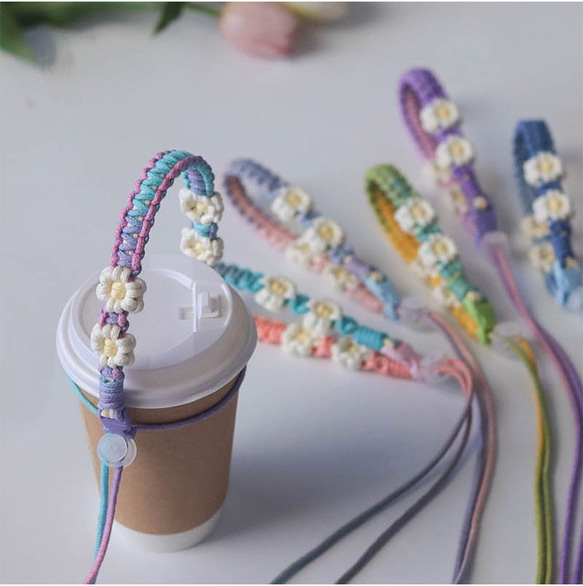 7色 デイジーの花手編みコーヒーカップベルト☆携帯用コップのコップカバ☆ミルクティーとアイスクリーム 1枚目の画像