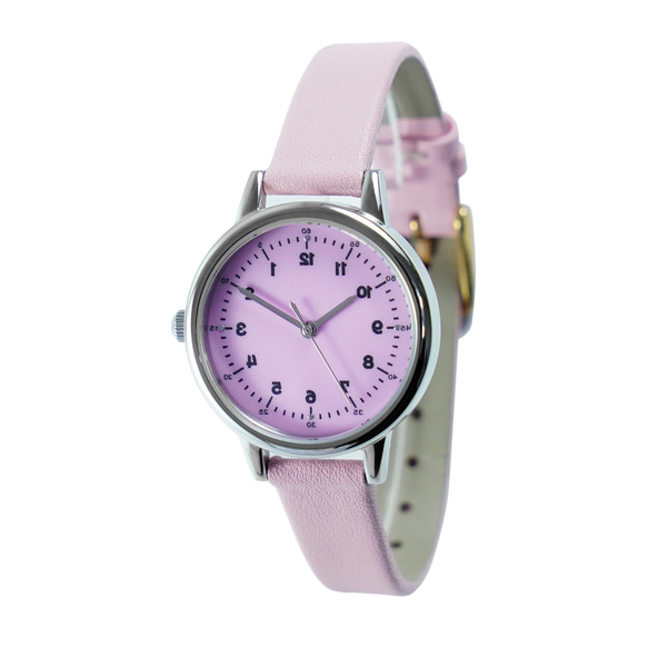 女性の反時計回りのエレガントな腕時計ピンクのダイヤルとストラップのパーソナライズされた腕時計世界中に無料配送 1枚目の画像