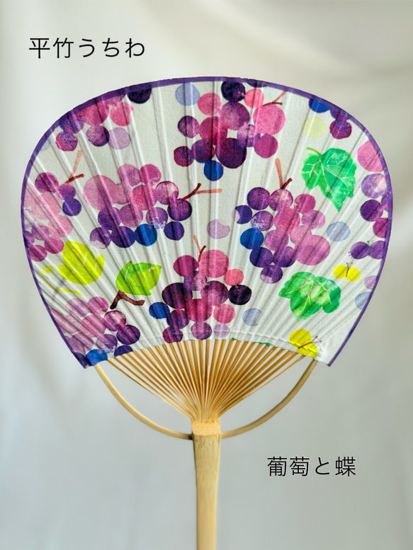 兩面都包有布料的扁平竹扇 第13張的照片