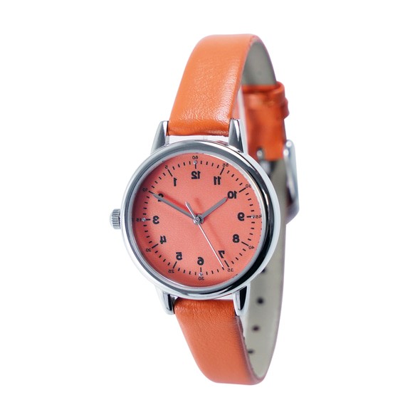 レディース 反時計回りのエレガントな腕時計 オレンジ ダイヤルとストラップ パーソナライズされた腕時計 世界中に無料配送 1枚目の画像