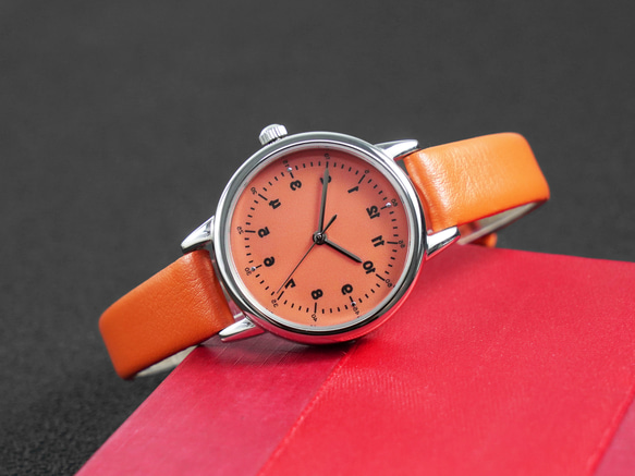 レディース 反時計回りのエレガントな腕時計 オレンジ ダイヤルとストラップ パーソナライズされた腕時計 世界中に無料配送 3枚目の画像