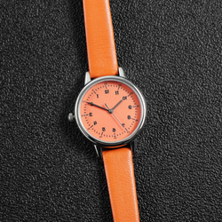 レディース 反時計回りのエレガントな腕時計 オレンジ ダイヤルとストラップ パーソナライズされた腕時計 世界中に無料配送 4枚目の画像