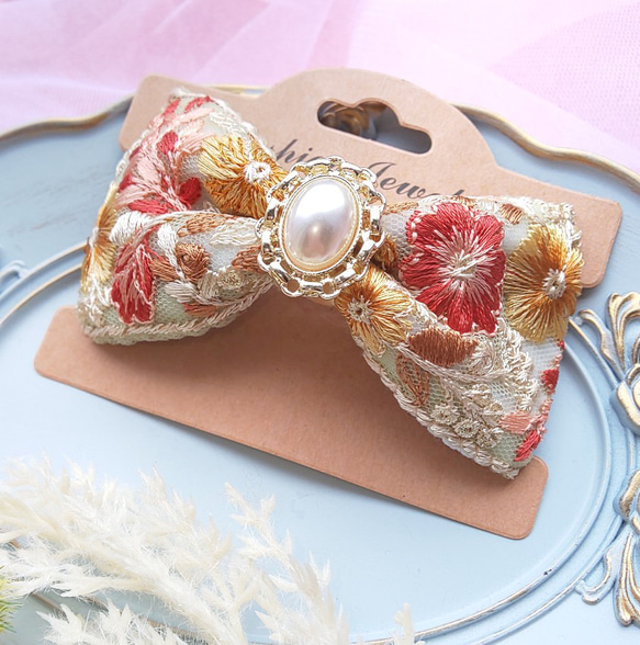 オレンジ と イエロー の 花柄 インド刺繍リボン の パール の 飾り