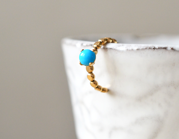 【14kgf】スリーピングビューティーターコイズのイヤーカフ 1枚目の画像