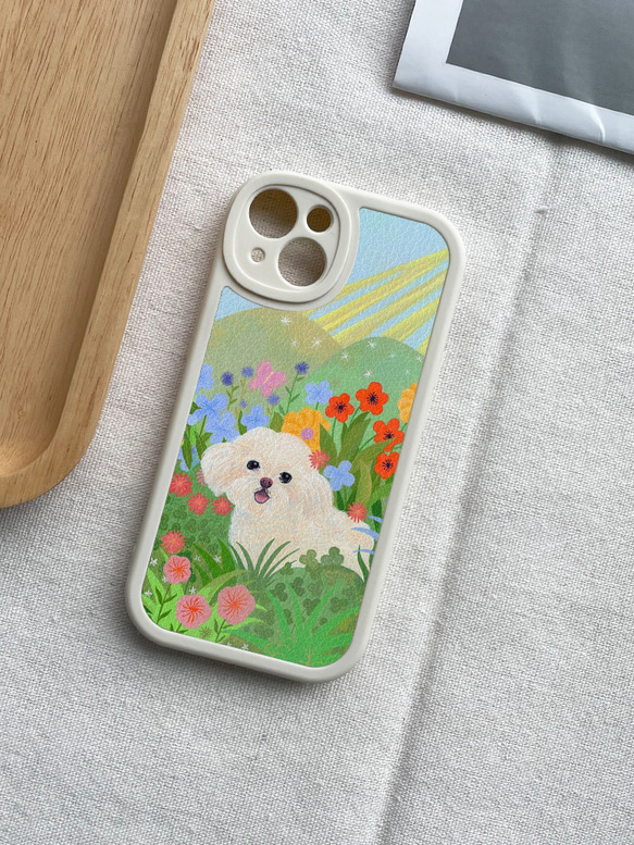 携帯電話保護ケースは、iPhone 15/14/13/12/11/10のすべてのモデルと互換性があります。かわいい花と犬のイラス 1枚目の画像