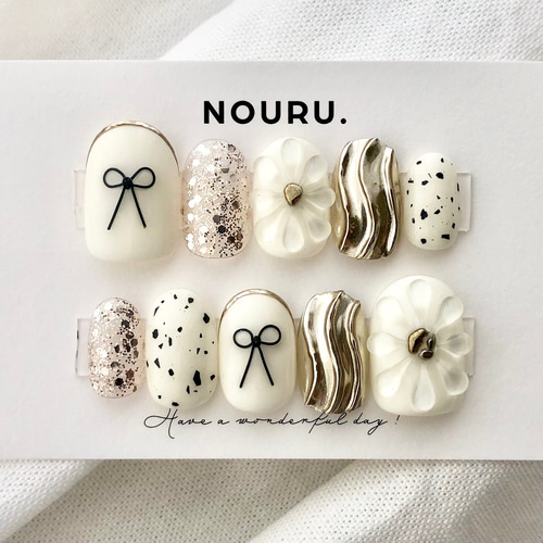 【オーダー】ネイルチップ　リボン　埋め尽くし　アイボリー オーダー】ネイルチップ リボン 埋め尽くし アイボリー