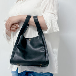 クラシックな黒のハンドバッグ/キャリーバッグ/小さなバッグを簡単に持ち運べます。 1枚目の画像