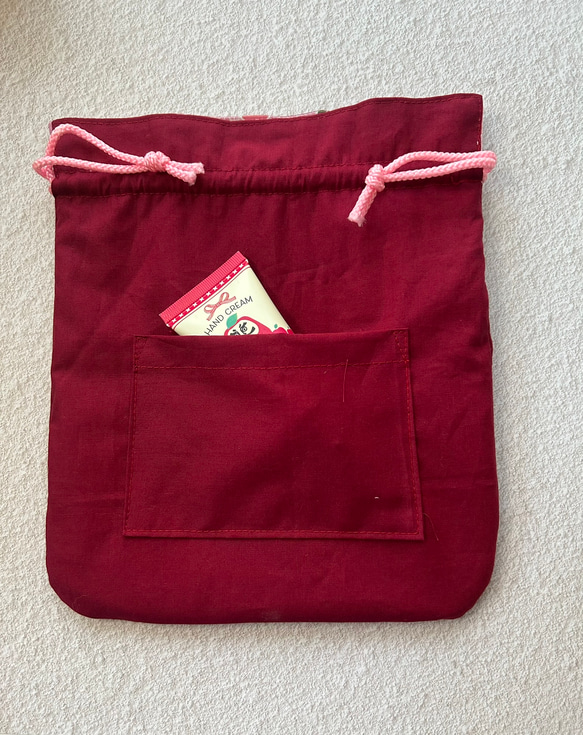 和柄　巾着袋　ピンク系　矢絣と椿　Lサイズ　裏付き　内ポケットあり　 2枚目の画像