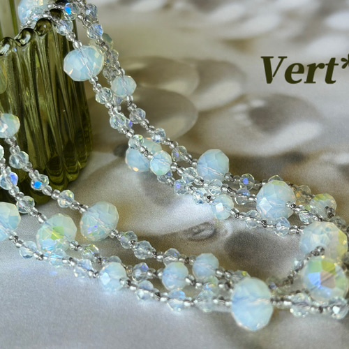 ホワイトオパールABロンデルカットグラスグリフィンロングネックレス 