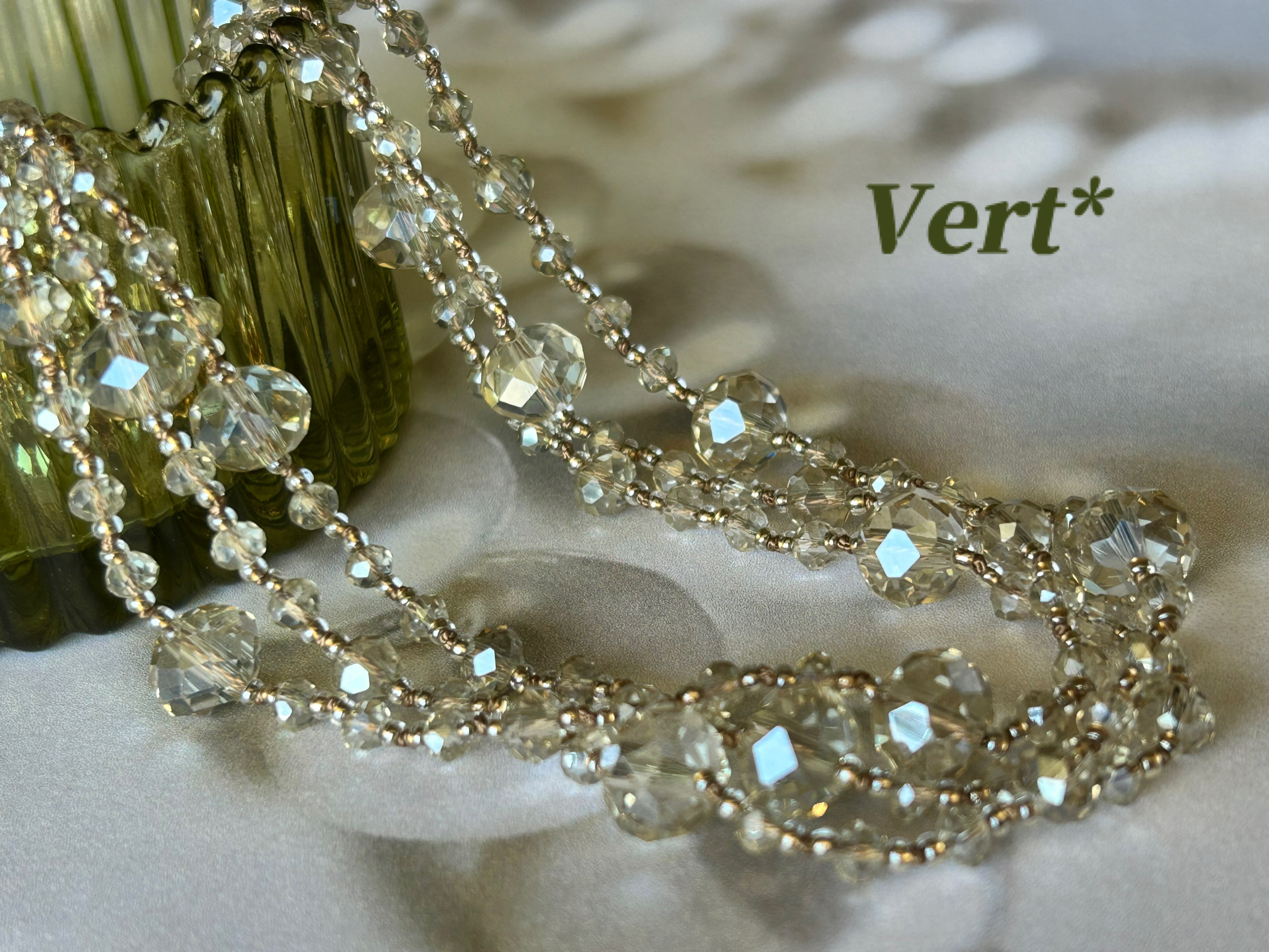 ライトシャンパンカラーロンデルカットグラスグリフィンロングネックレス