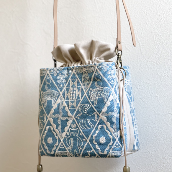 あおりポケットの巾着バッグ＊ミナペルホネン Symphony ⚮̈ミナペルホネン symphony blue ネリオバッグ あおり巾着バッグ