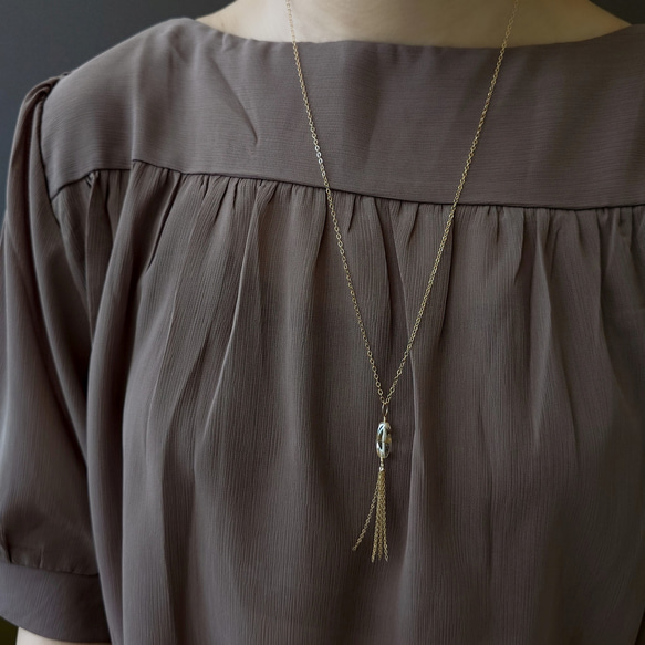 ブロンド クリスタル タッセル 14Kgf ゴールドフィルド ネックレス ミディアム丈 ドレス チェーン セーター チェーン | 1枚目の画像