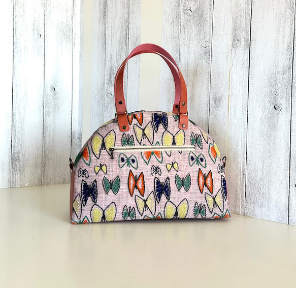 Creema限定、ミナペルホネンのSky flowerのピンクとパッチ半円ボストン